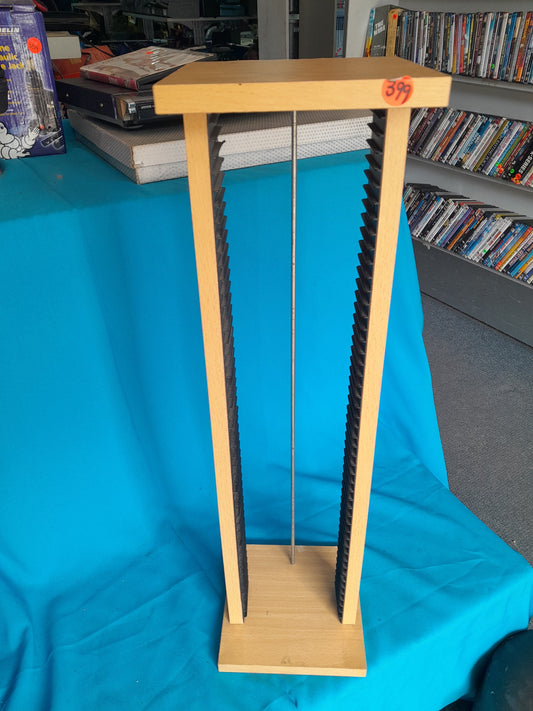 Wooden CD storage rack featuring a sturdy design with a metal rod for organization, ideal for secondhand goods at Die Skatkis.