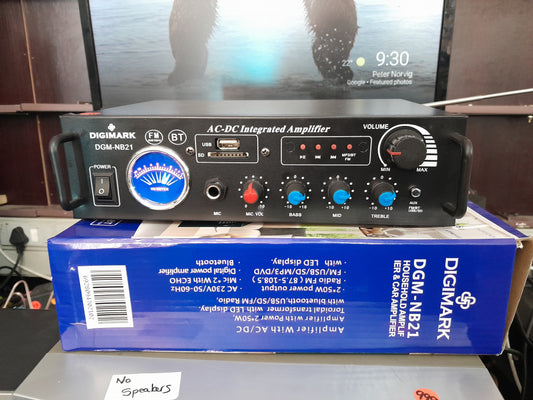 Digimark DGM-NB21 amplifier displayed on its original box, highlighting features like FM radio and USB.