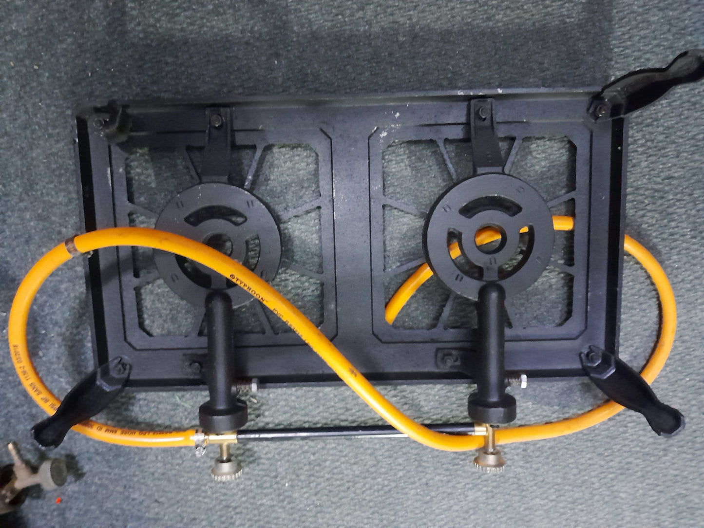 Reliable 2 plate gas burner, made of cast iron, suitable for various cooking needs.
