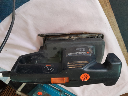 Black and Decker BD180E orbital sander, efficient tool for sanding multiple materials.