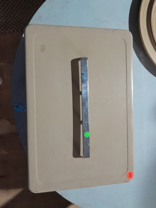 Durable vintage cash box with a metal handle, designed for secure storage of cash and documents.