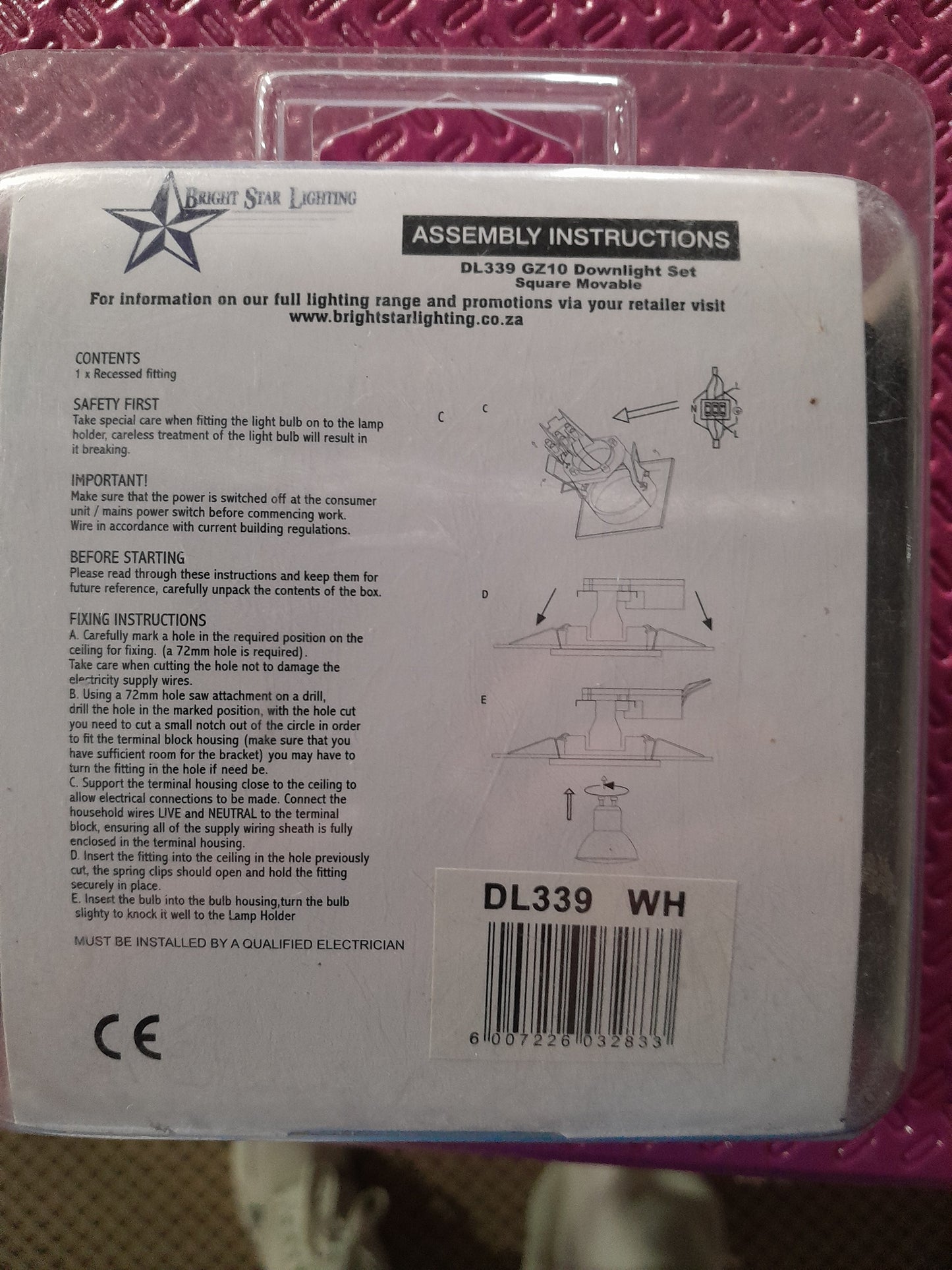 Step-by-step assembly instructions for a white downlighter, suitable for various settings.