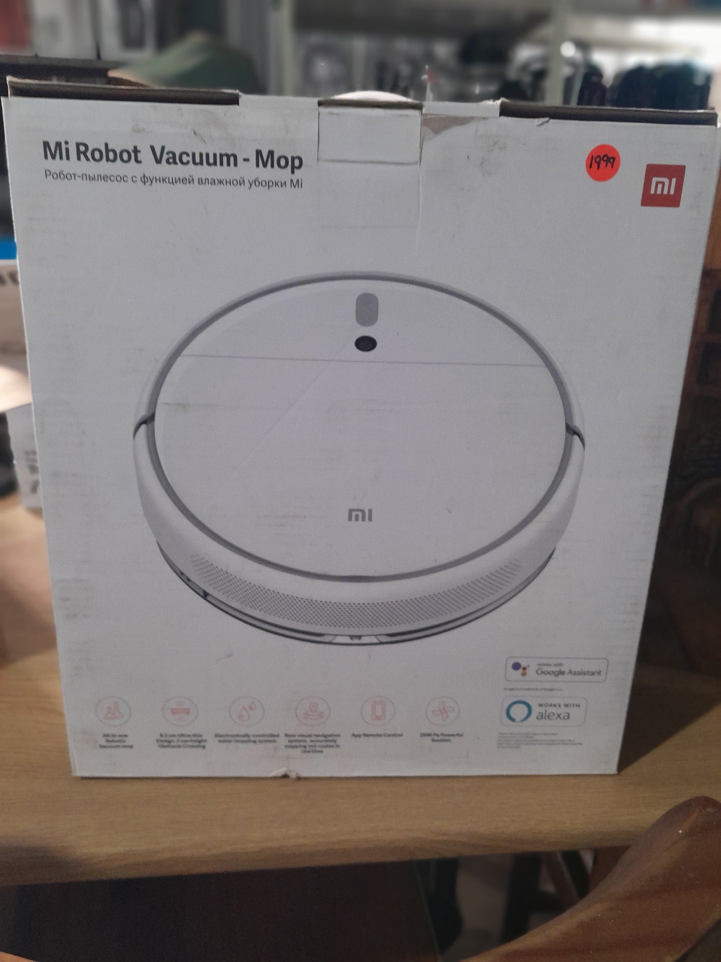 Mi Robot Vacuum Mop box showcasing advanced features and sleek design for efficient cleaning.