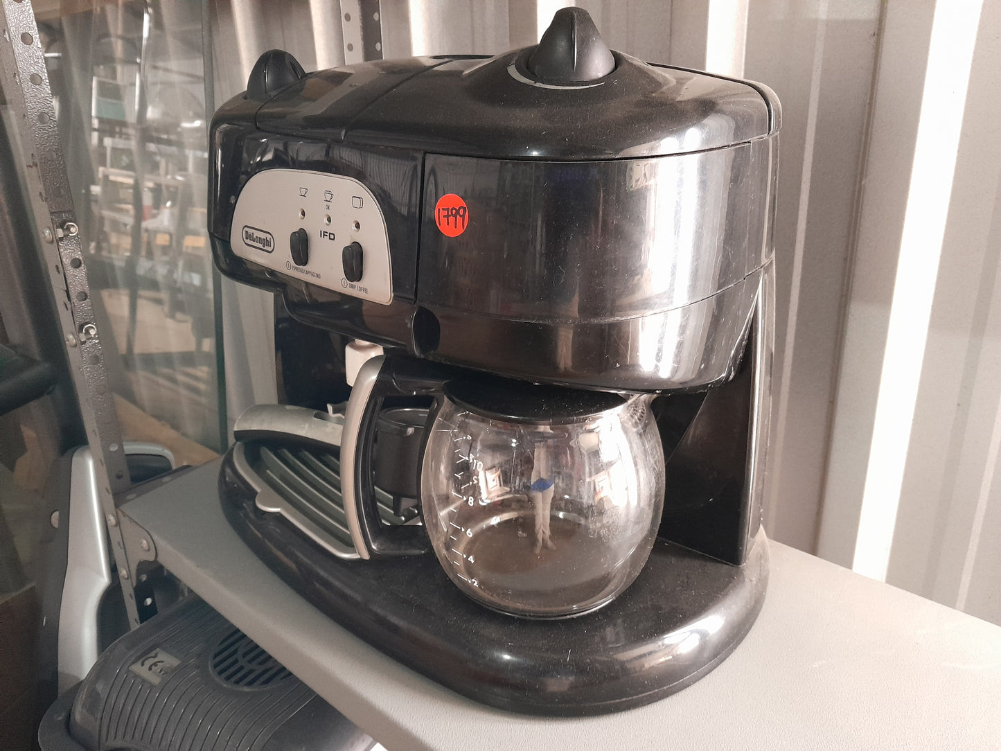 Delonghi espresso and drip coffee maker, perfect for creating rich coffee at home.