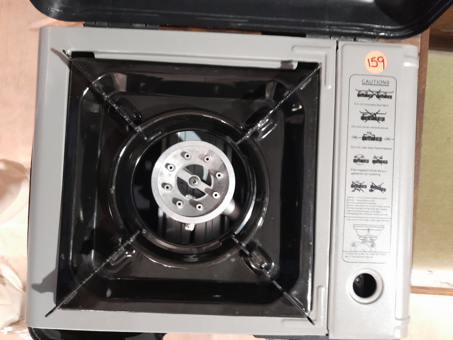 A top view of a Bush Baby camping stove, perfect for outdoor cooking and camping adventures.