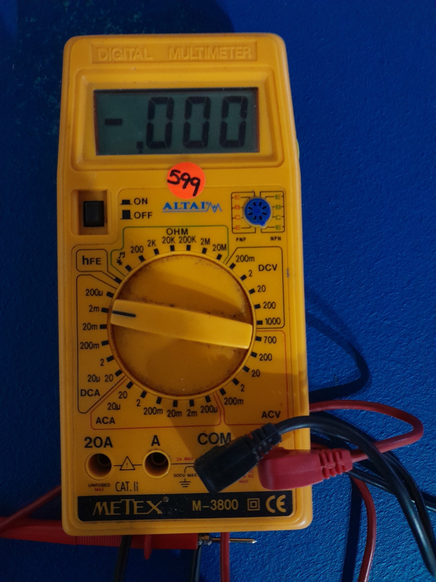 ltai Metex M-3800 digital multimeter displaying measurements for electronics testing.