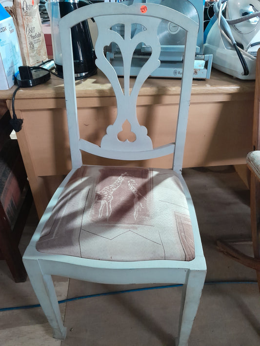 Vintage solid wood chair with giraffe-patterned cushioned seat and elegant backrest design, ideal for home decor.