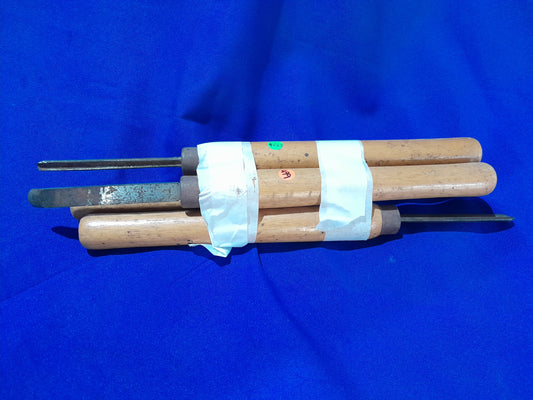 Carbon 4 Pcs Turning wood chisel set with wooden handles and sturdy metal blades, displayed on a blue background.