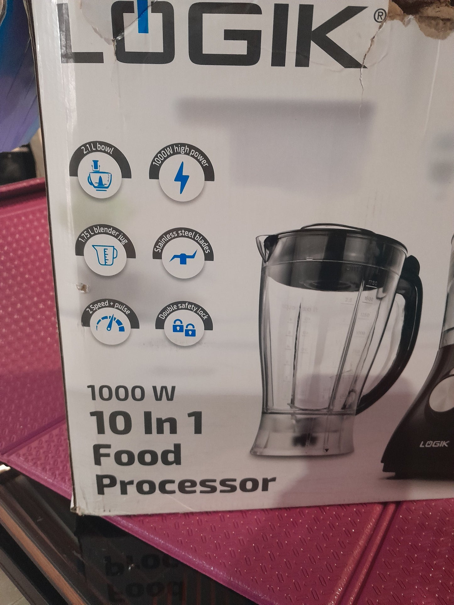 LOGIK 10 In 1 Food Processor with 1000W motor, 2.1L bowl, stainless steel blades, and double safety lock for versatile use.