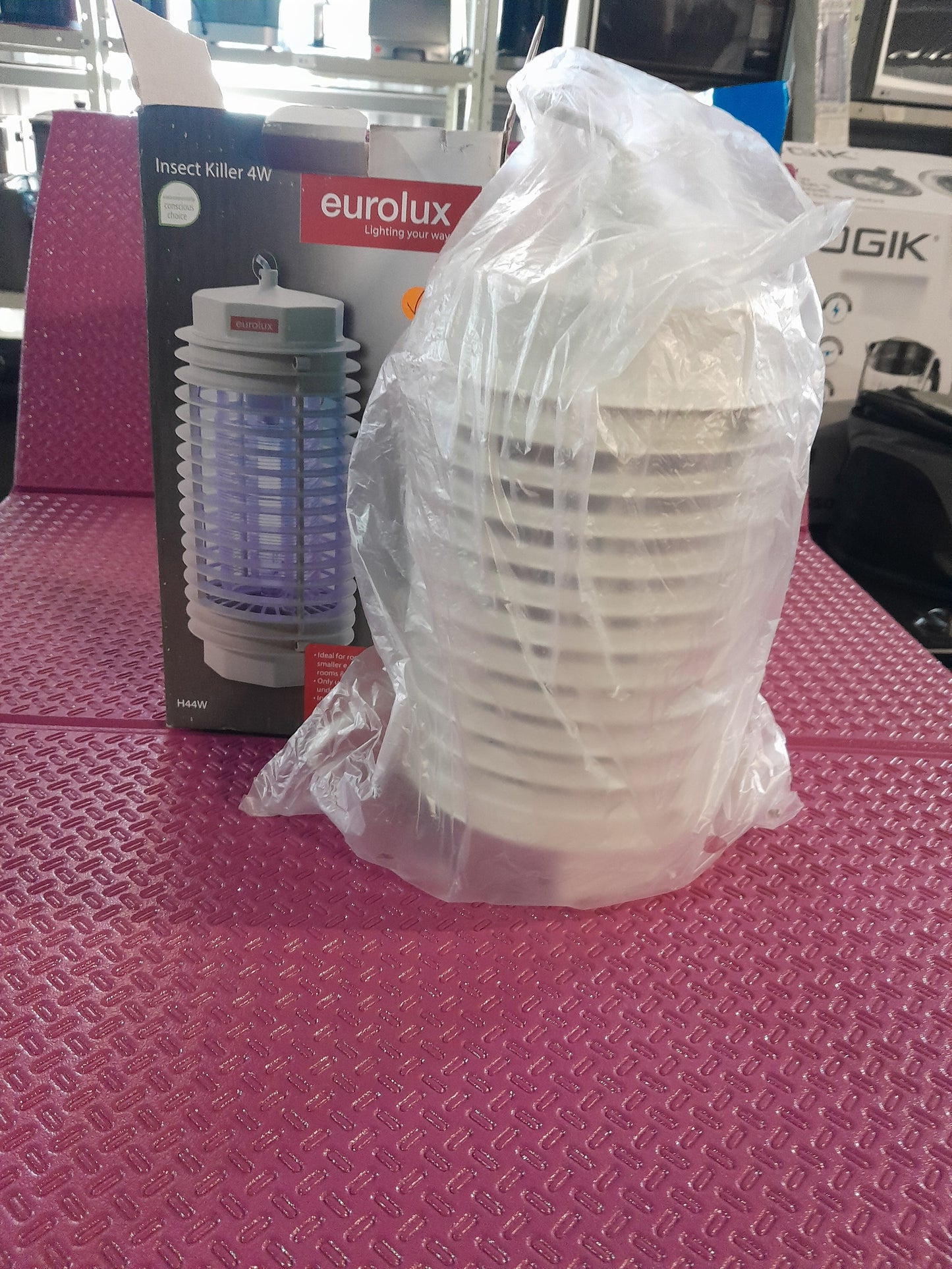 Compact Eurolux insect killer with sleek design and efficient bulb system for safe indoor insect elimination.