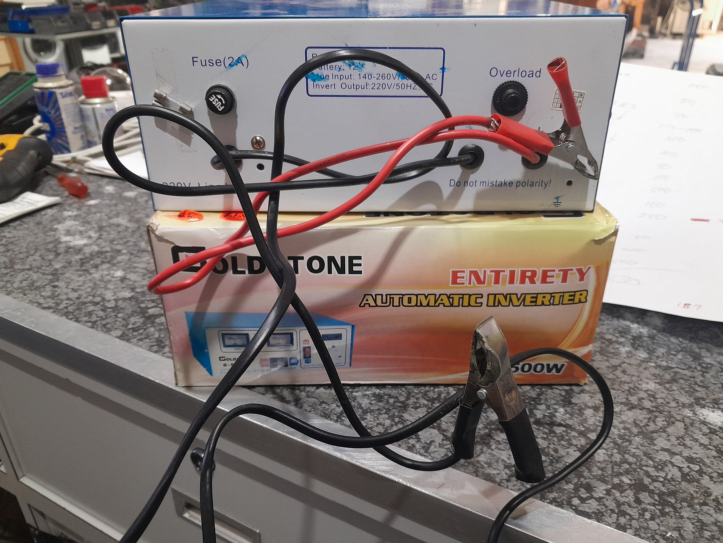 Golstone G-500W inverter in use, ideal for converting battery power to AC power.