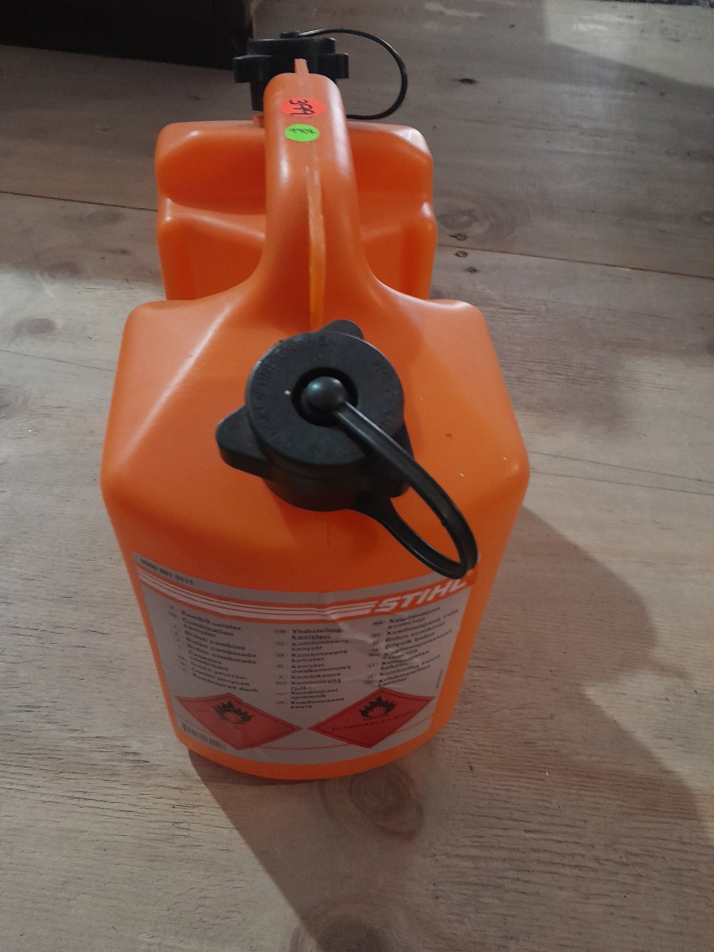 Secondhand Stihl Combi Canister for safe transport of fuel and chain oil for chainsaws.