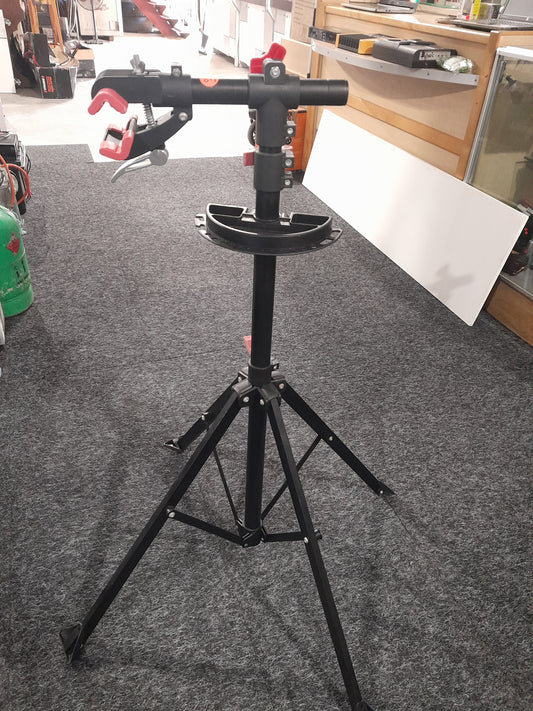 Tork Craft bicycle repair stand, perfect for home or workshop use, sturdy and adjustable for easy bike maintenance.