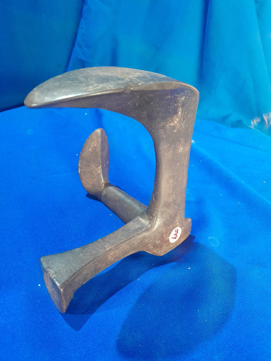 Cast iron cobbler's shoe last tool for shoe making and repair, ideal for DIY projects.