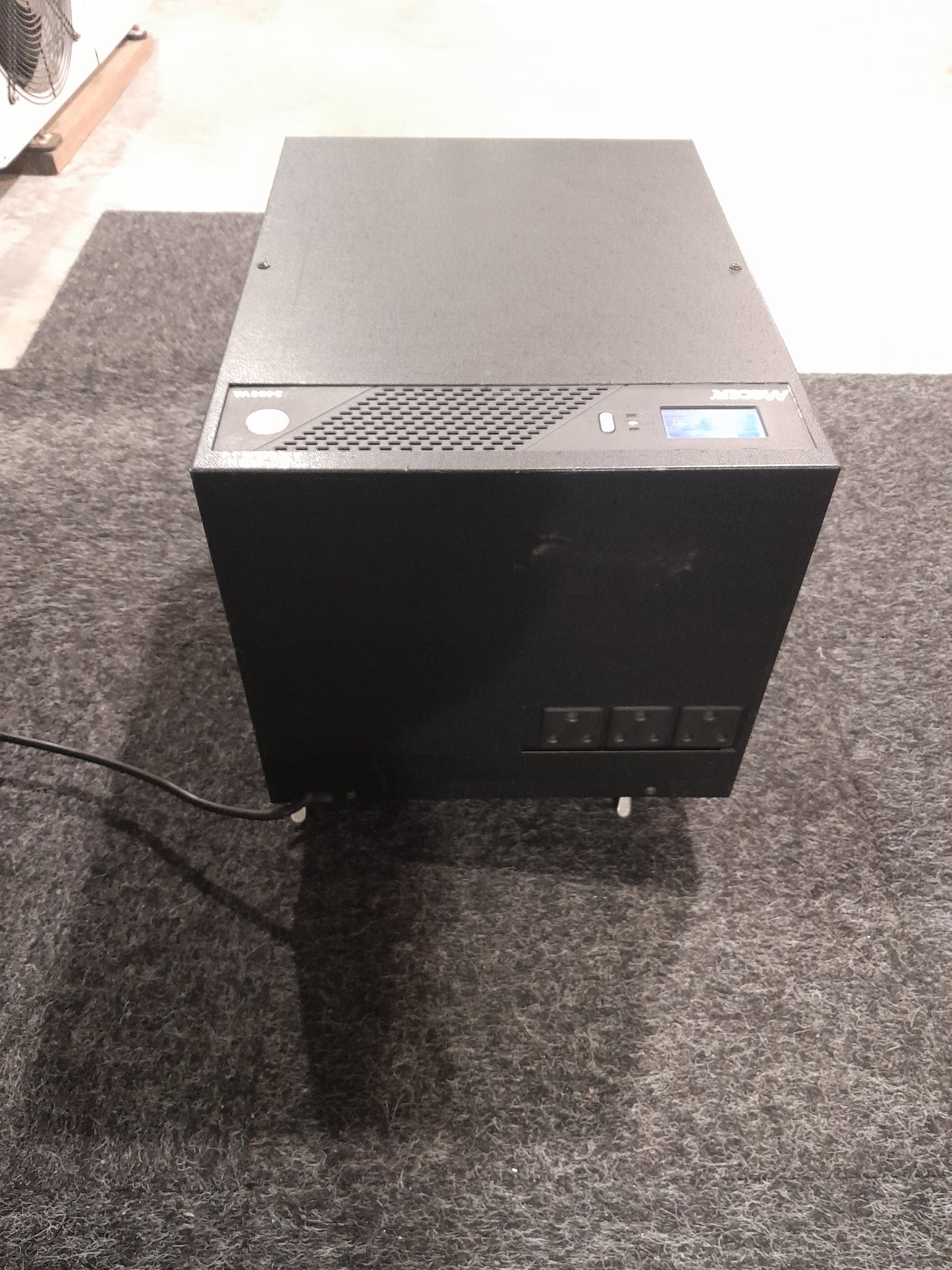 Compact Mecer 2.4 KVA inverter featuring a durable casing and easy-to-read LCD display.