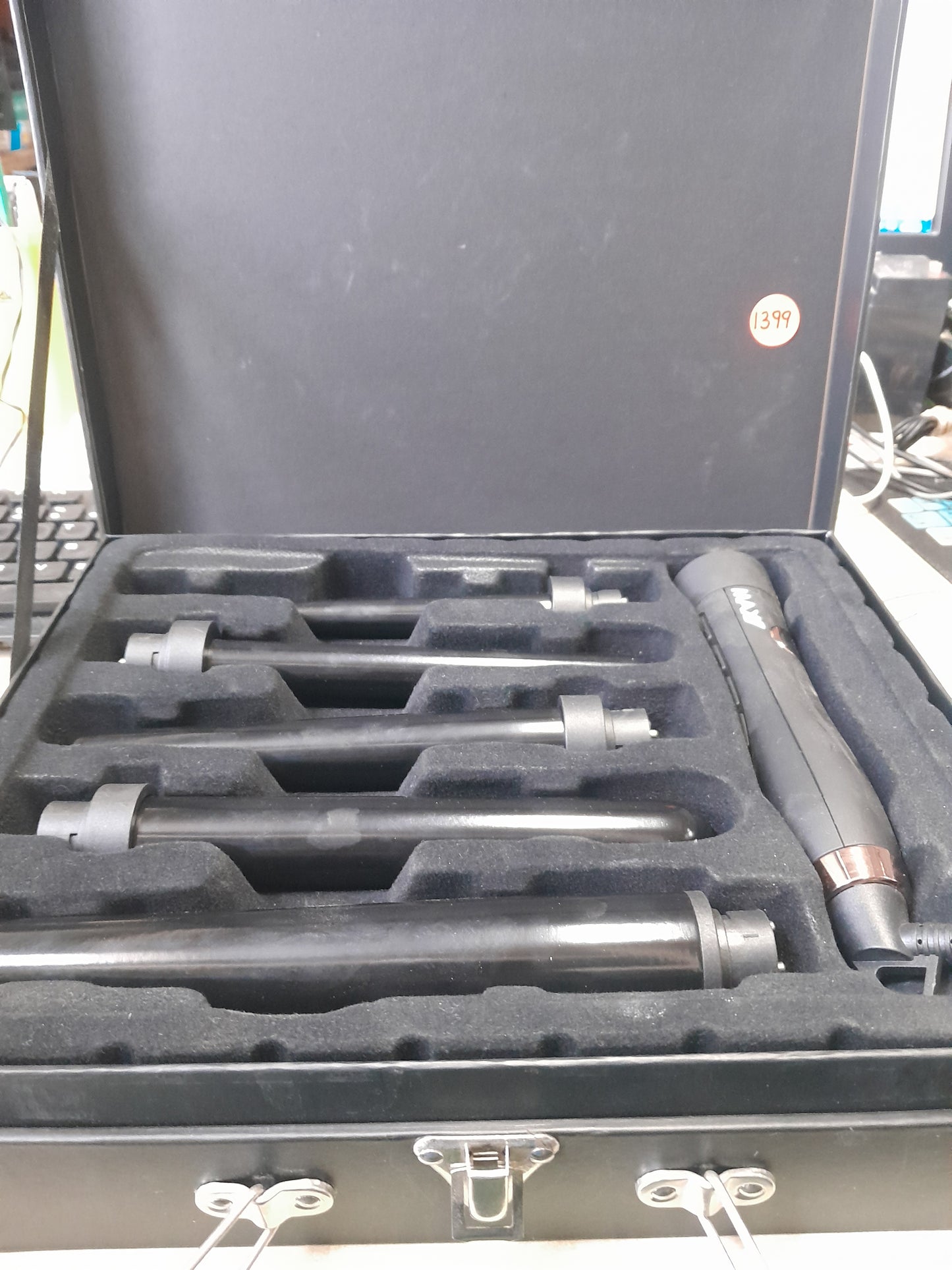 Detailed view of Max Pro Miracle 5 in 1 Curling Tongs with multiple barrels for soft waves and curls.