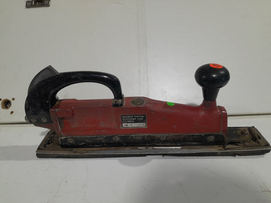 Air powered straight line sander for smooth finishes on wood and metal surfaces.