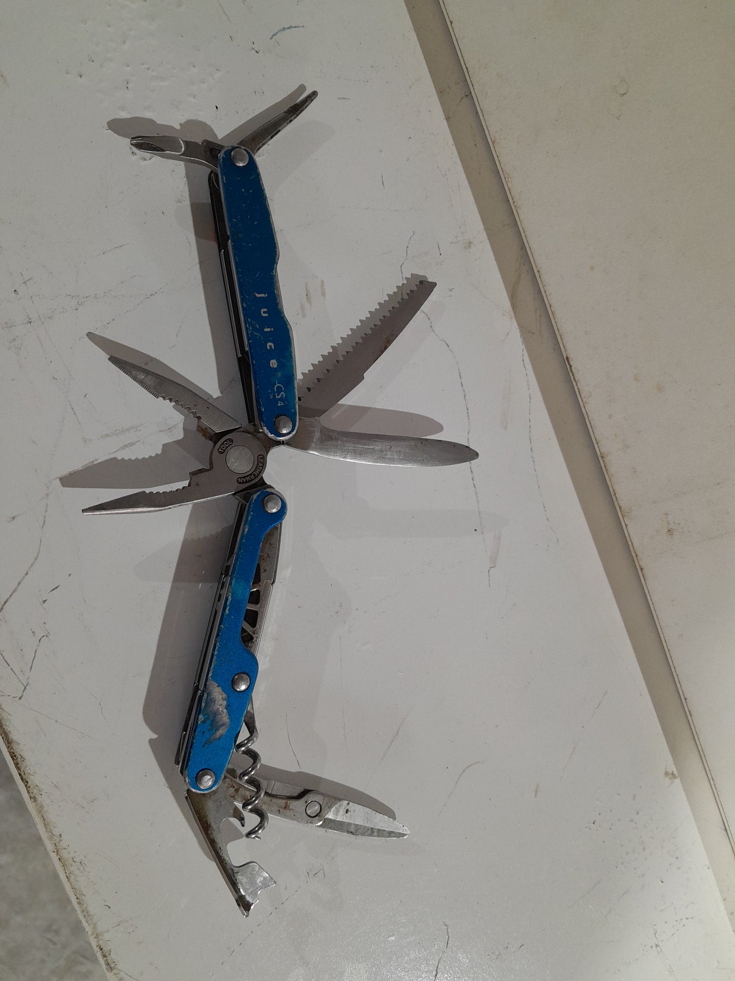 Leatherman Juice CS4 multi-tool featuring compact design, suitable for camping and home repairs