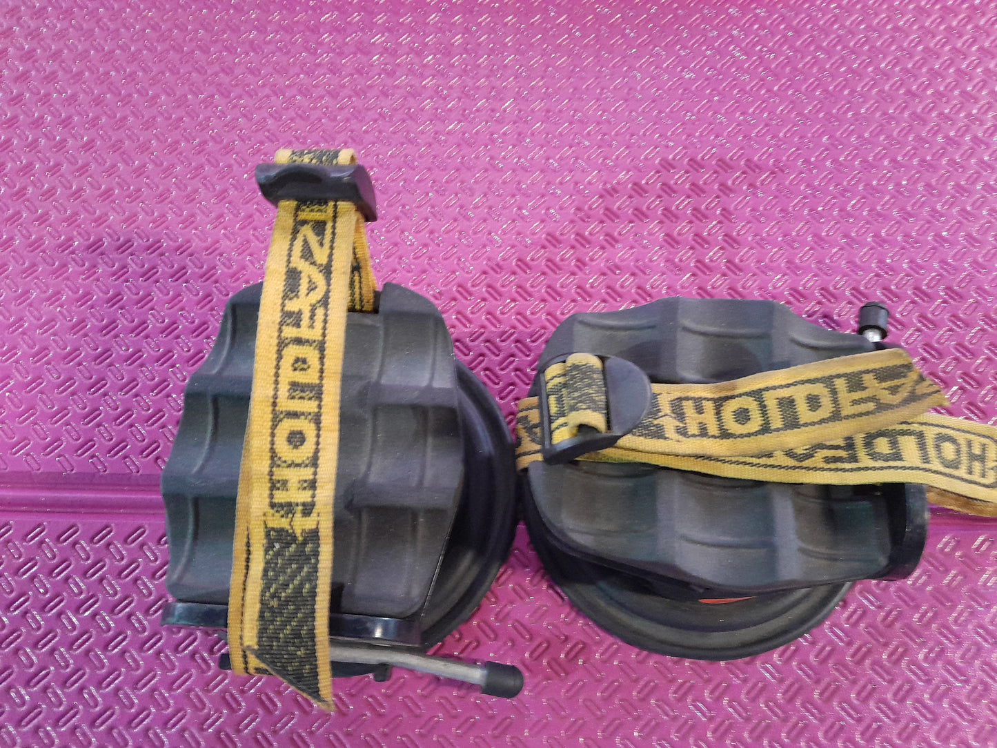 Durable Holdfast Fishing Rod Holder with suction cups, perfect for various vehicle types.
