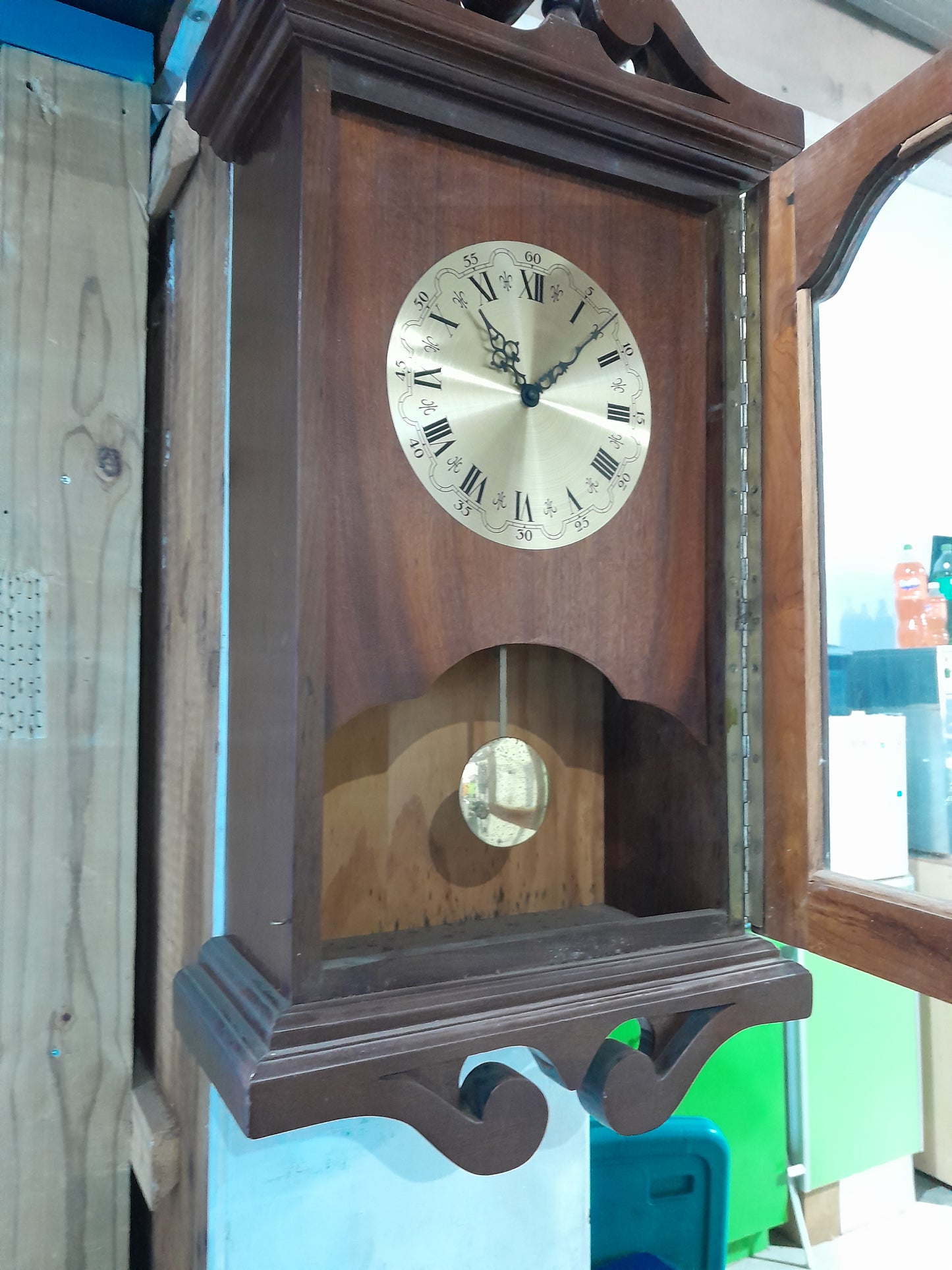 Beautifully crafted vintage clock, not functioning, serves as a unique ornamental piece.