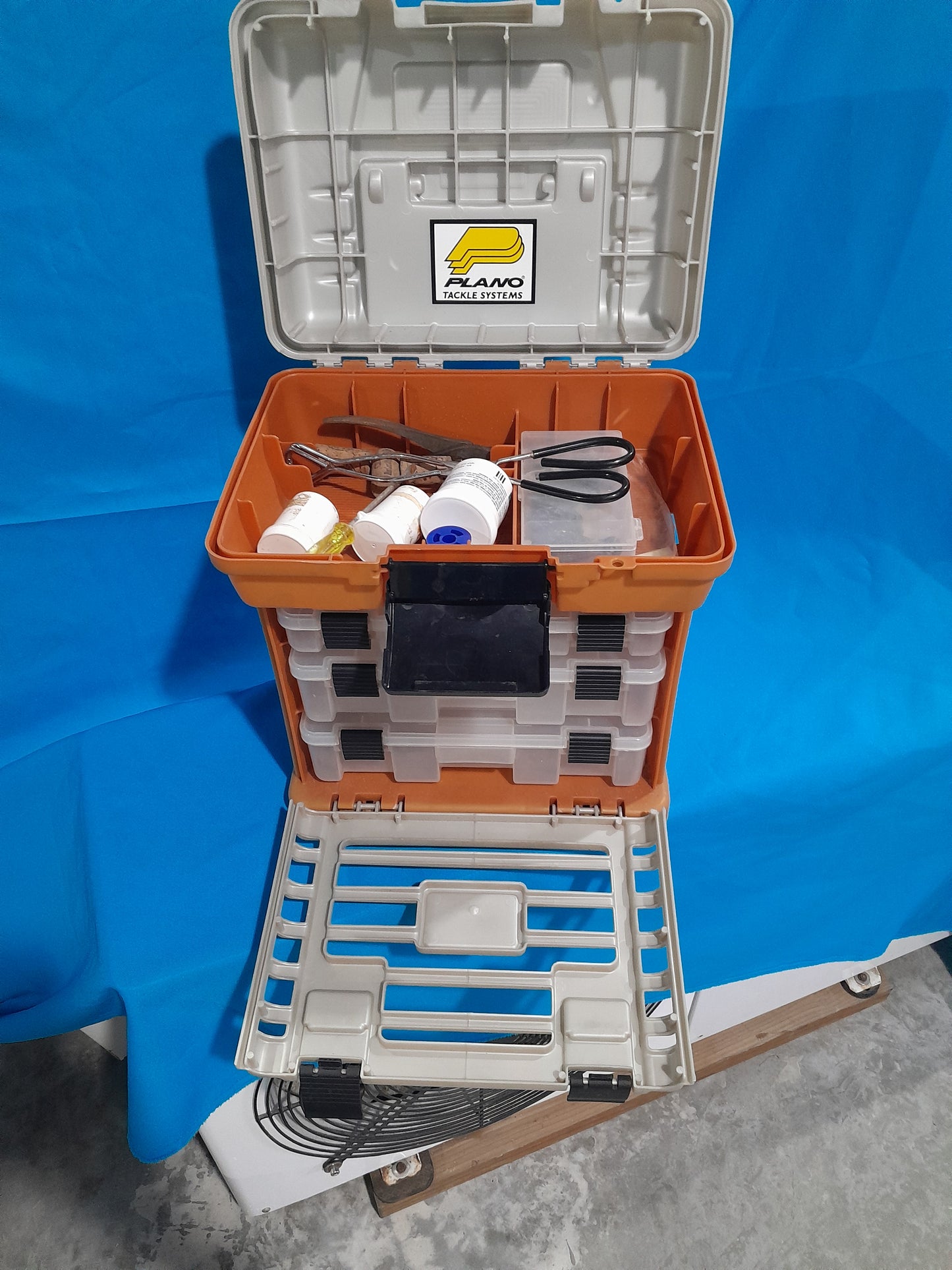 Plano gear organizer tackle box with three compartments, great for fishing enthusiasts and DIY projects.