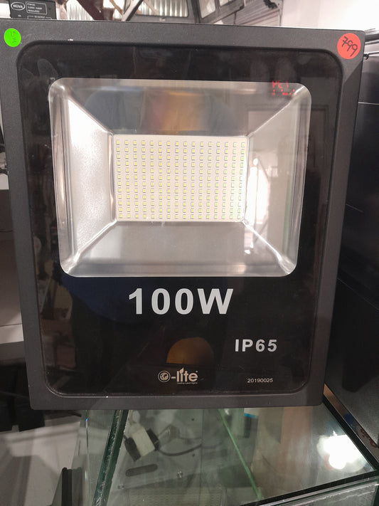 e-lite 100W LED floodlight displayed in secondhand store, suitable for various outdoor lighting needs.