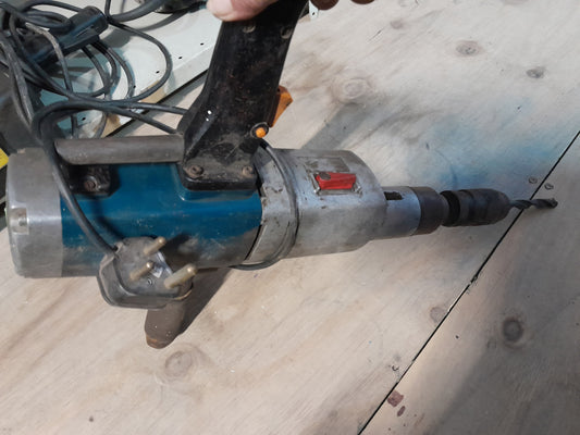 Reliable AEG 1050W jackhammer for sale, great for drilling concrete and tough surfaces.