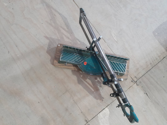 20-inch compound mitre saw with adjustable angles for precise cutting tasks.