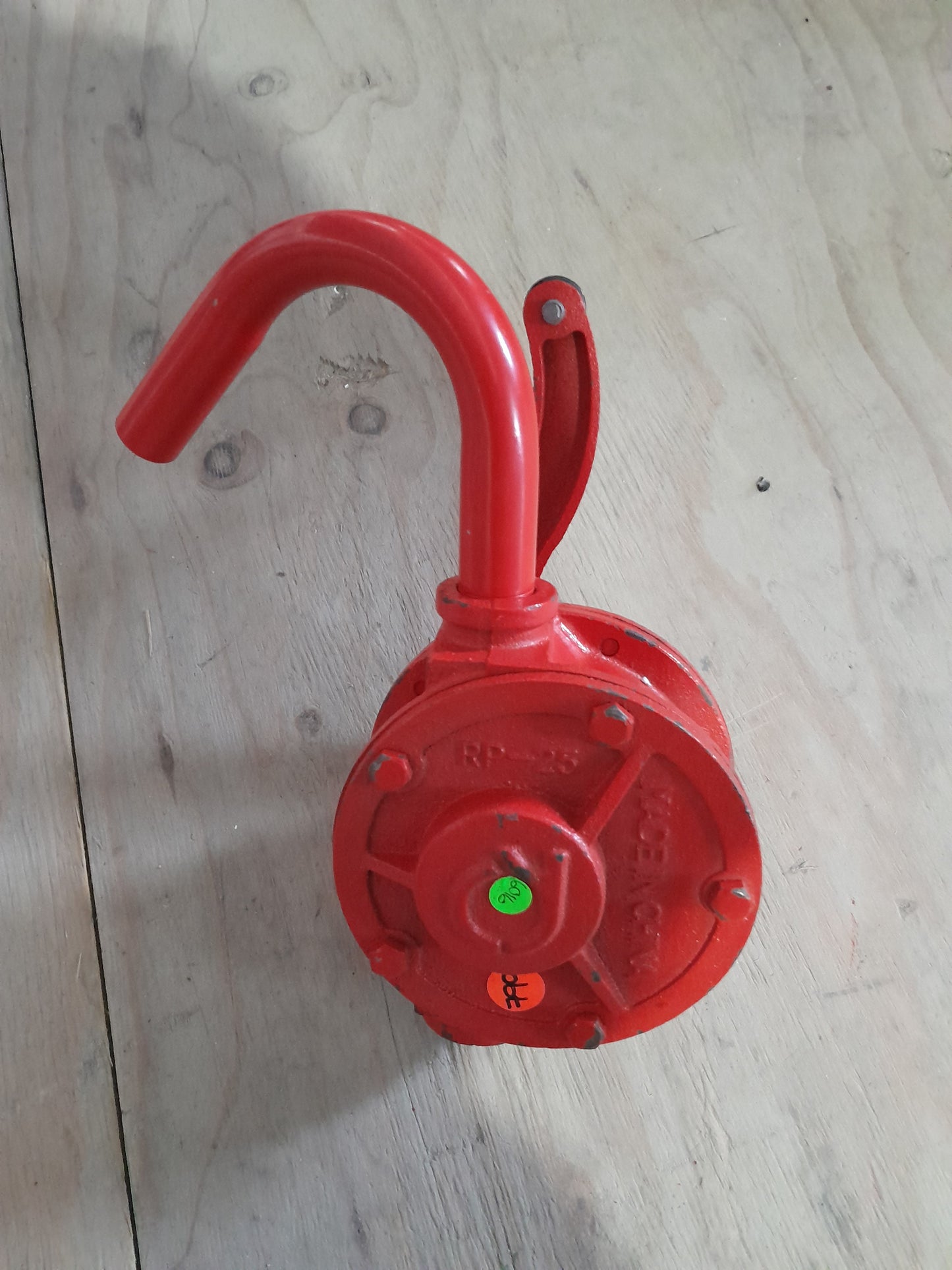 Hand-operated drum pump by Koshin, ideal for home and garden use, made from durable cast iron.