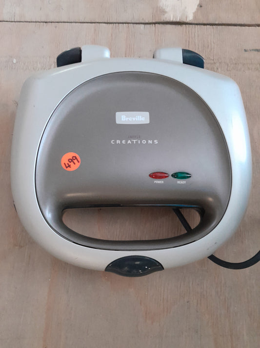 Breville Jaffle Creations sandwich maker, model SG 2300B, perfect for delicious toasted sandwiches.