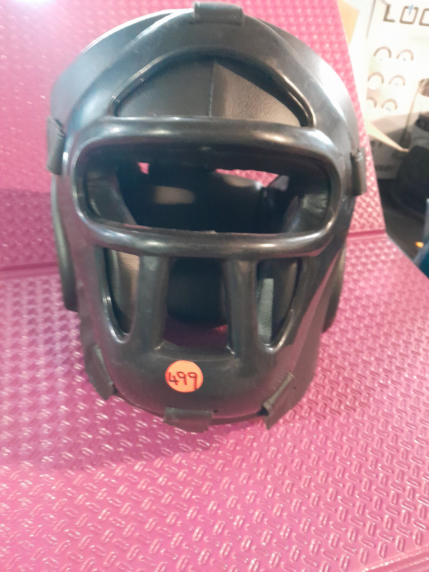 High-quality MMA headgear made of leather, featuring a hard plate for enhanced protection.