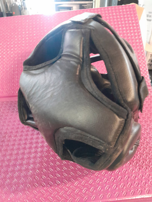 Quality sparring headgear made from leather, perfect for MMA training and competitive fighting.