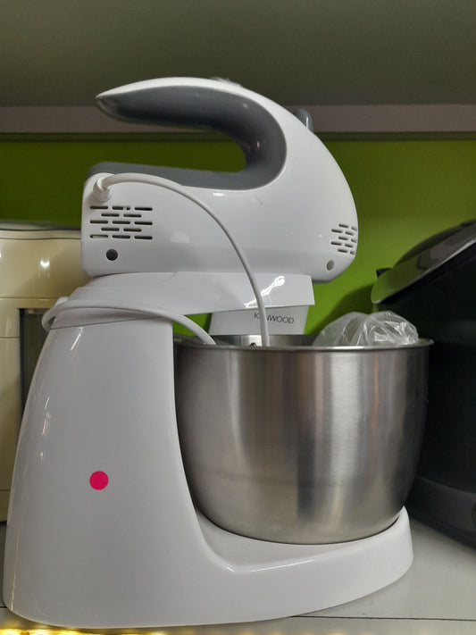 Logik 5 Speed Stand Mixer with bowl, dough hooks, and beaters for versatile cooking.