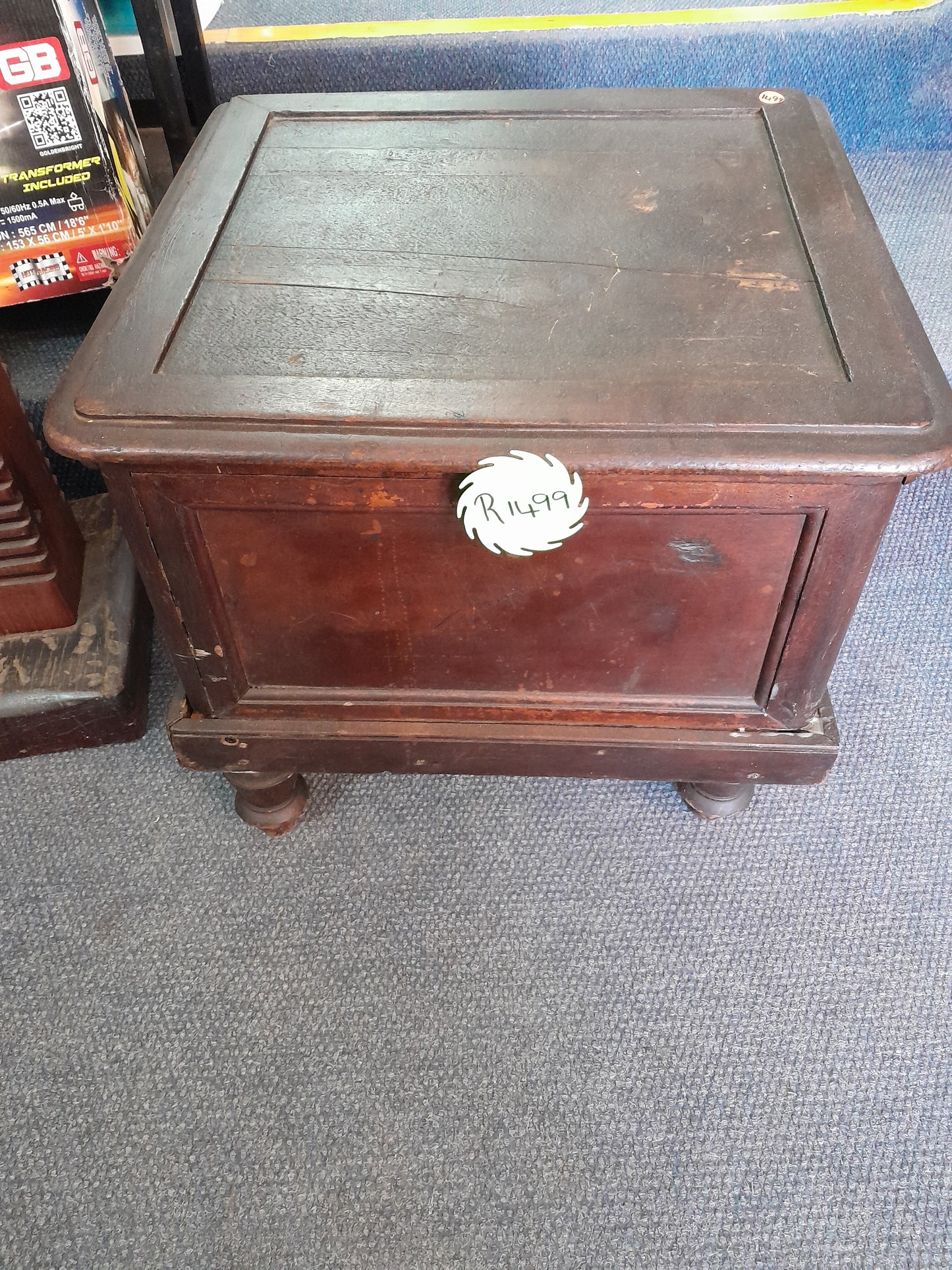 Antique wooden potty with dark finish, paneled sides, and visible signs of age, for sale at Die Skatkis.