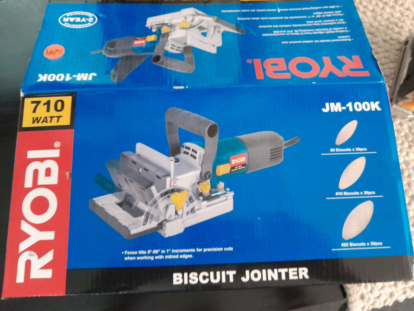 Ryobi JM-100K Biscuit Jointer packaging, highlighting its 710W motor, and adjustable fence for precision cuts.