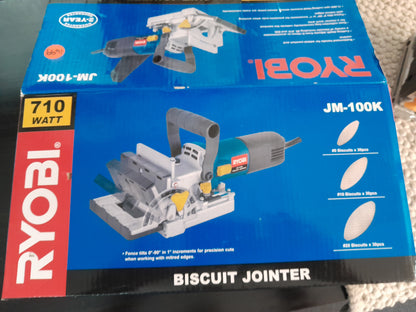 Ryobi JM-100K Biscuit Jointer packaging, highlighting its 710W motor, and adjustable fence for precision cuts.