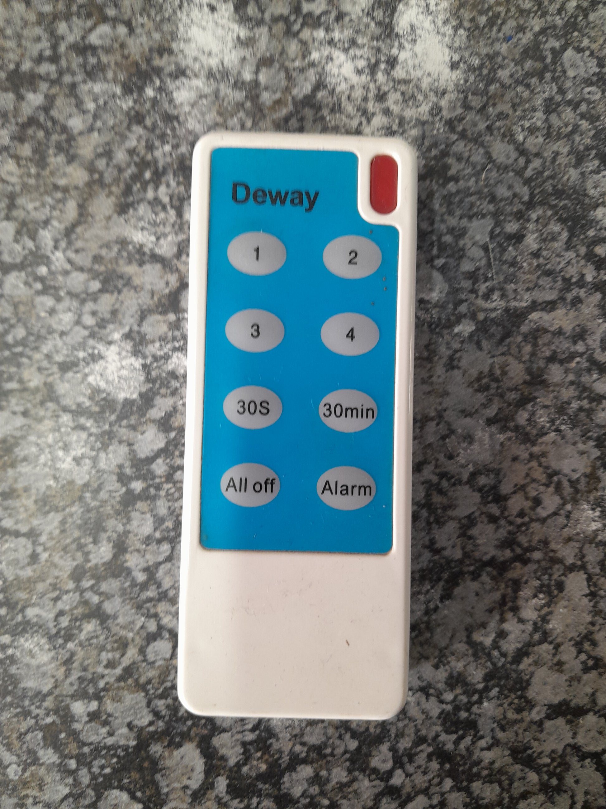 Deway remote control with various settings, including timer and alarm functions. Used for controlling devices with multiple options. Available at Die Skatkis.