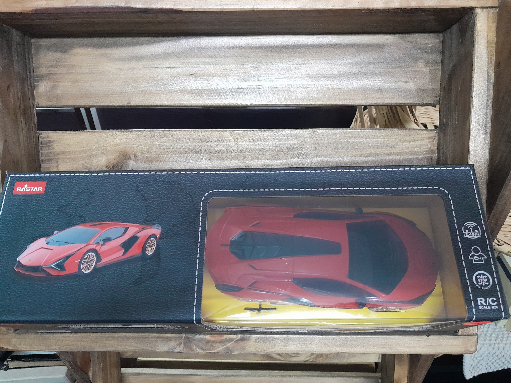 "Boxed Rastar Lamborghini Sian FKP 37 RC car, 1/24 scale, red with black accents, suitable for ages 6 and up.