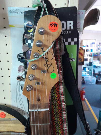 3-tone Santa Fe electric guitar ready for sale in a secondhand shop, perfect for aspiring musicians.
