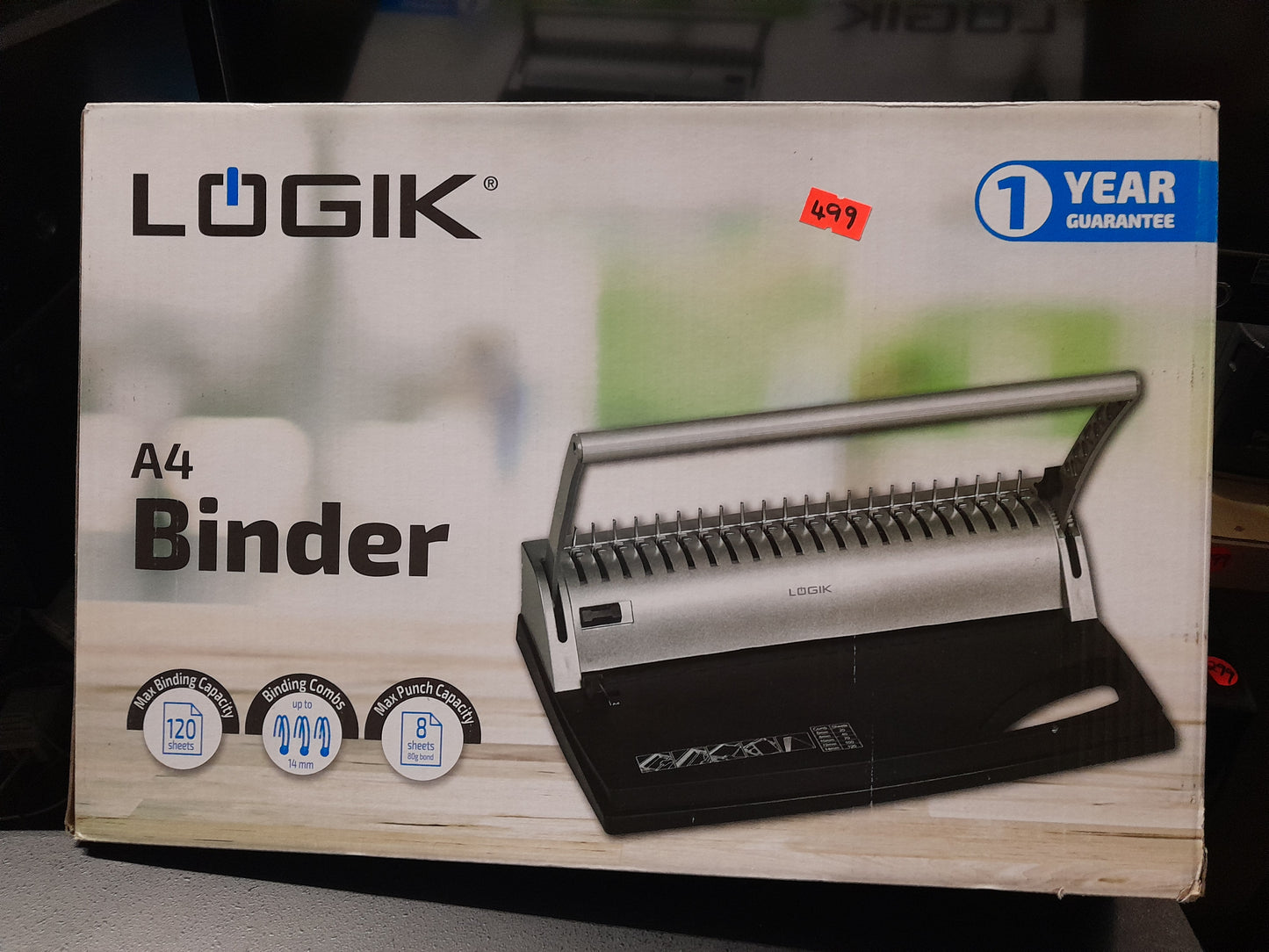 "Logik A4 Binder packaging highlighting features like 1-year guarantee, 120 sheet capacity, and 14mm binding combs.