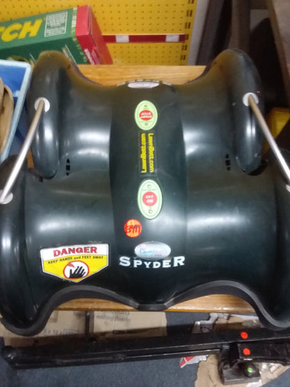 "LawnBot Spyder robotic lawnmower with safety labels, green control buttons, and LawnBot.com branding. Available at Die Skatkis.
