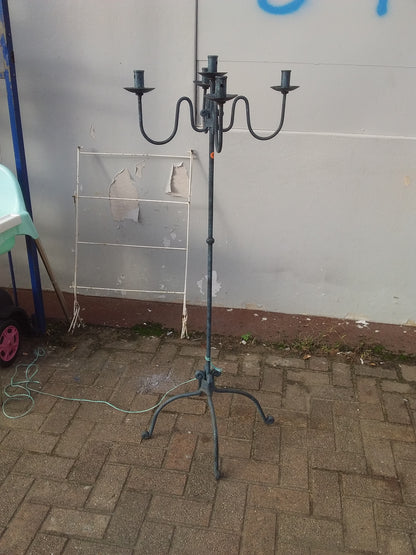 Rustic steel 5-candle holder with weathered appearance, perfect for vintage décor, available at Die Skatkis secondhand store.