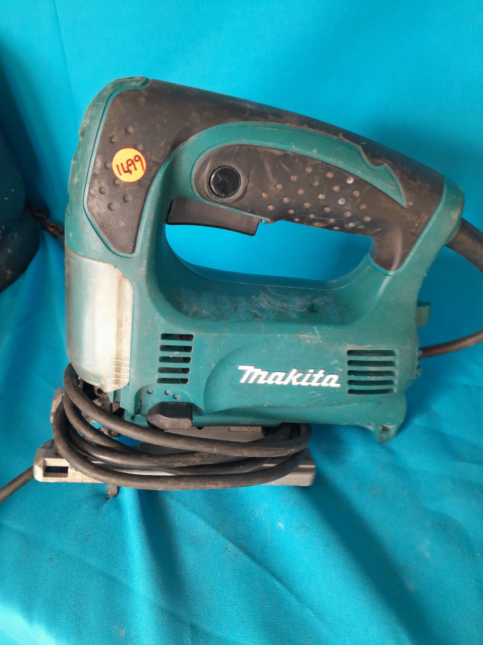 Reliable Makita jigsaw model 4329, a versatile hand tool for woodworking and crafting.