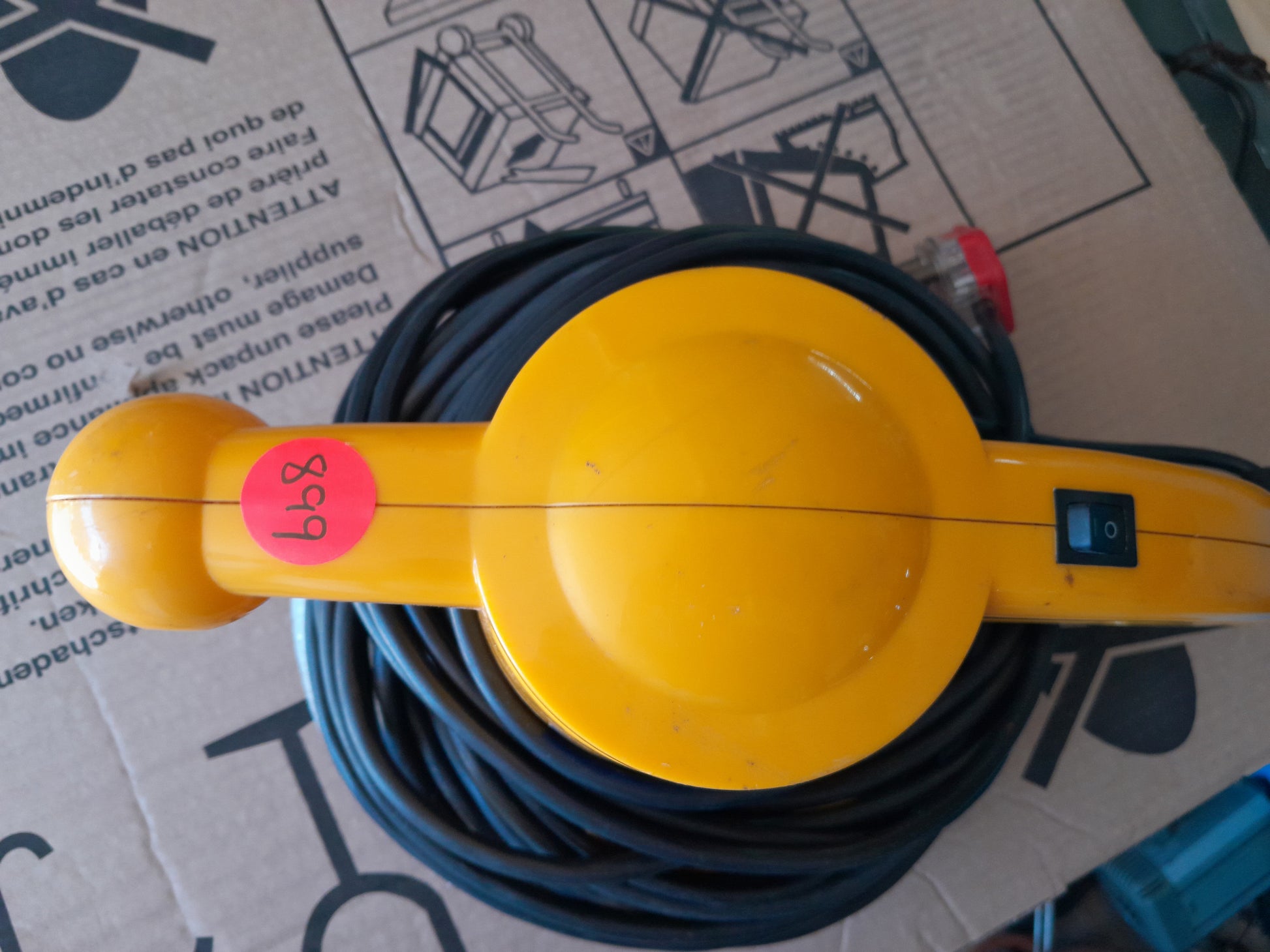 Top view of Shield Orbital Polisher highlighting its ergonomic design and yellow finish.