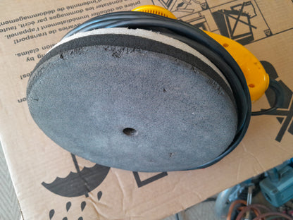 Close-up of the polishing pad on a Shield Orbital Polisher, highlighting its texture and condition.