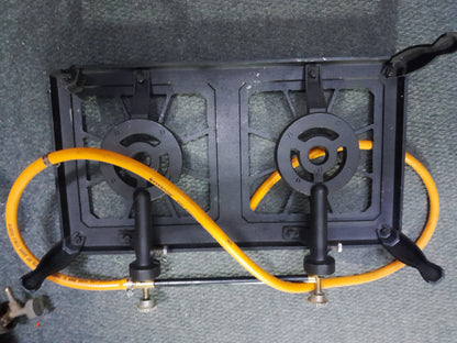 Reliable 2 plate gas burner, made of cast iron, suitable for various cooking needs.