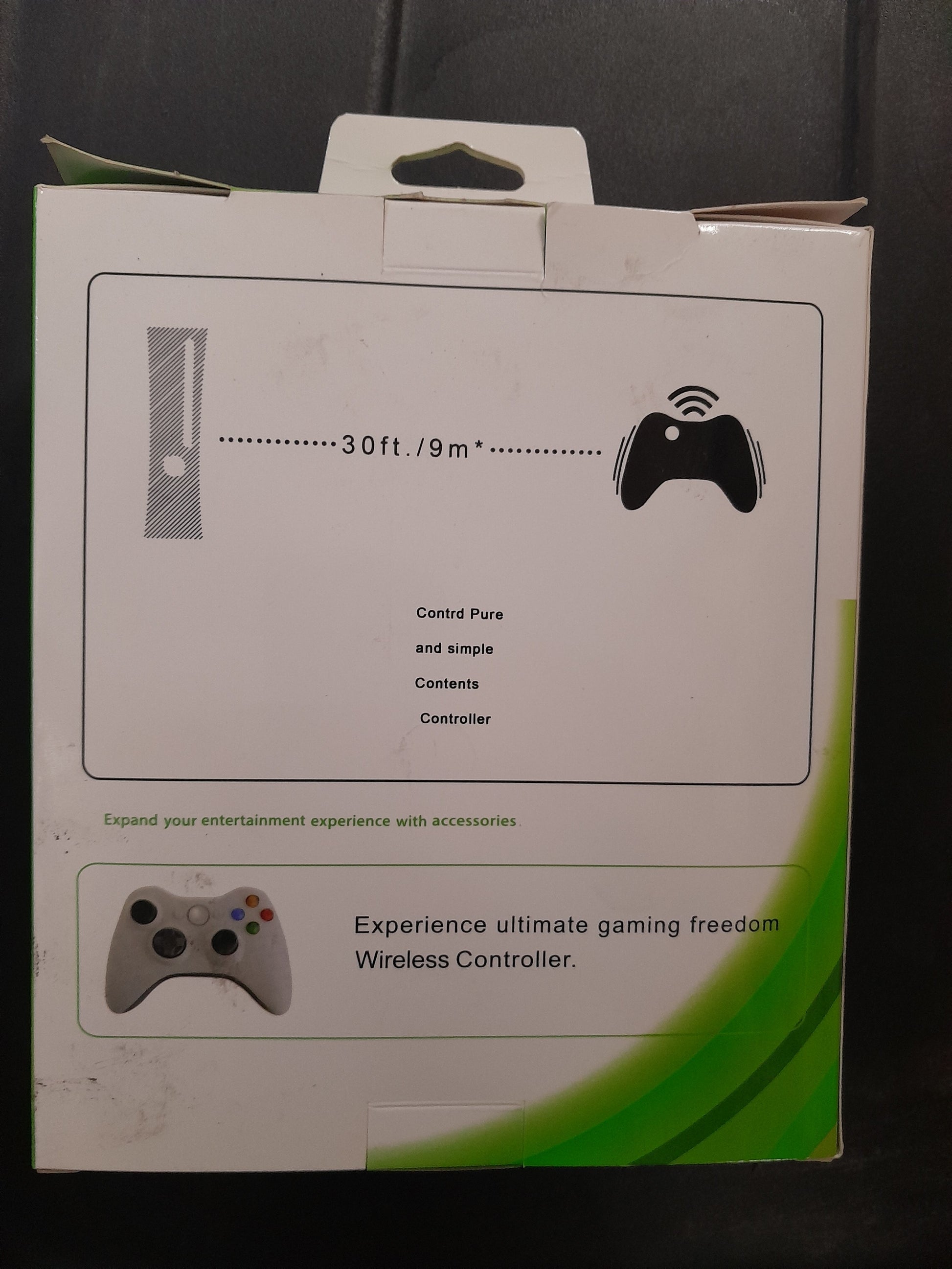 Box of Xbox 360 wireless remote controller showcasing features and design.
