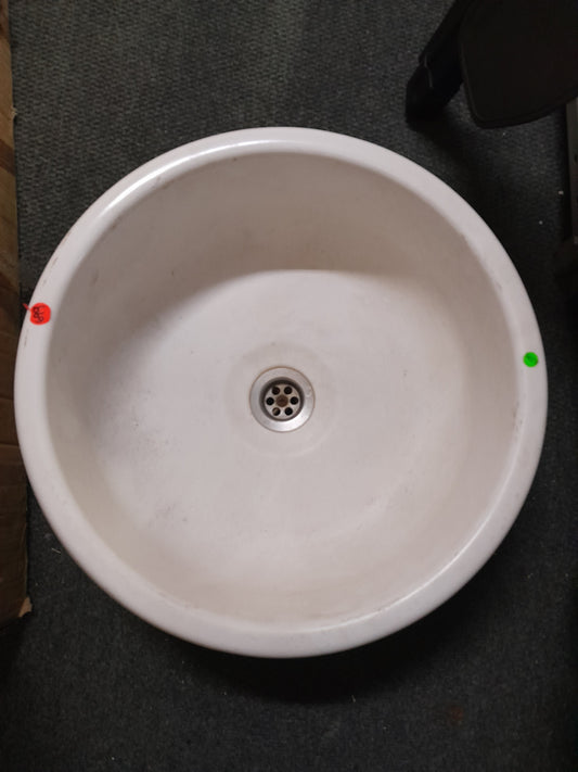 Affordable round white basin from Die Skatkis, perfect for DIY home improvement and renovations.