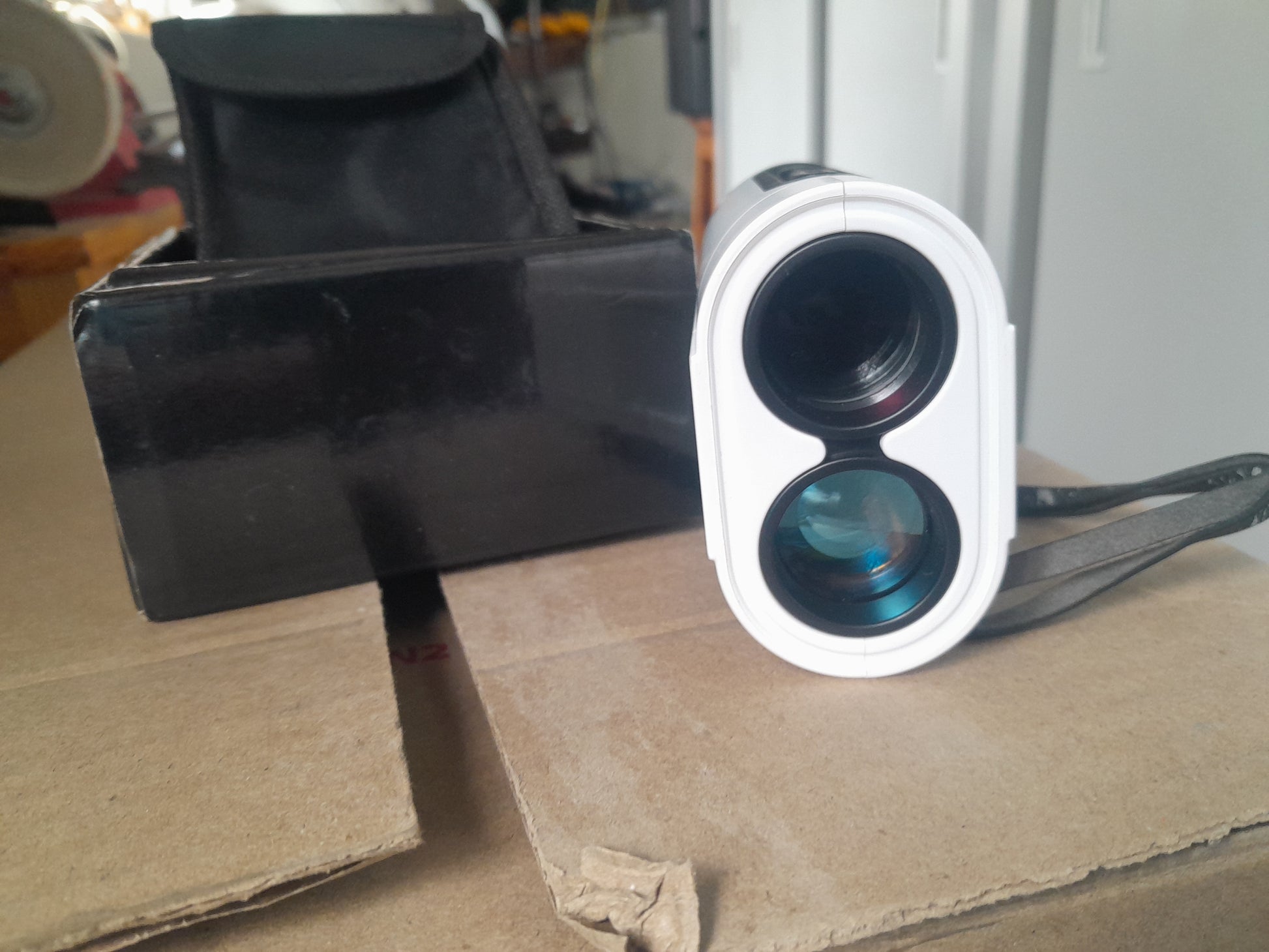 Tonor laser rangefinder with protective case, perfect for measuring distances on the golf course.