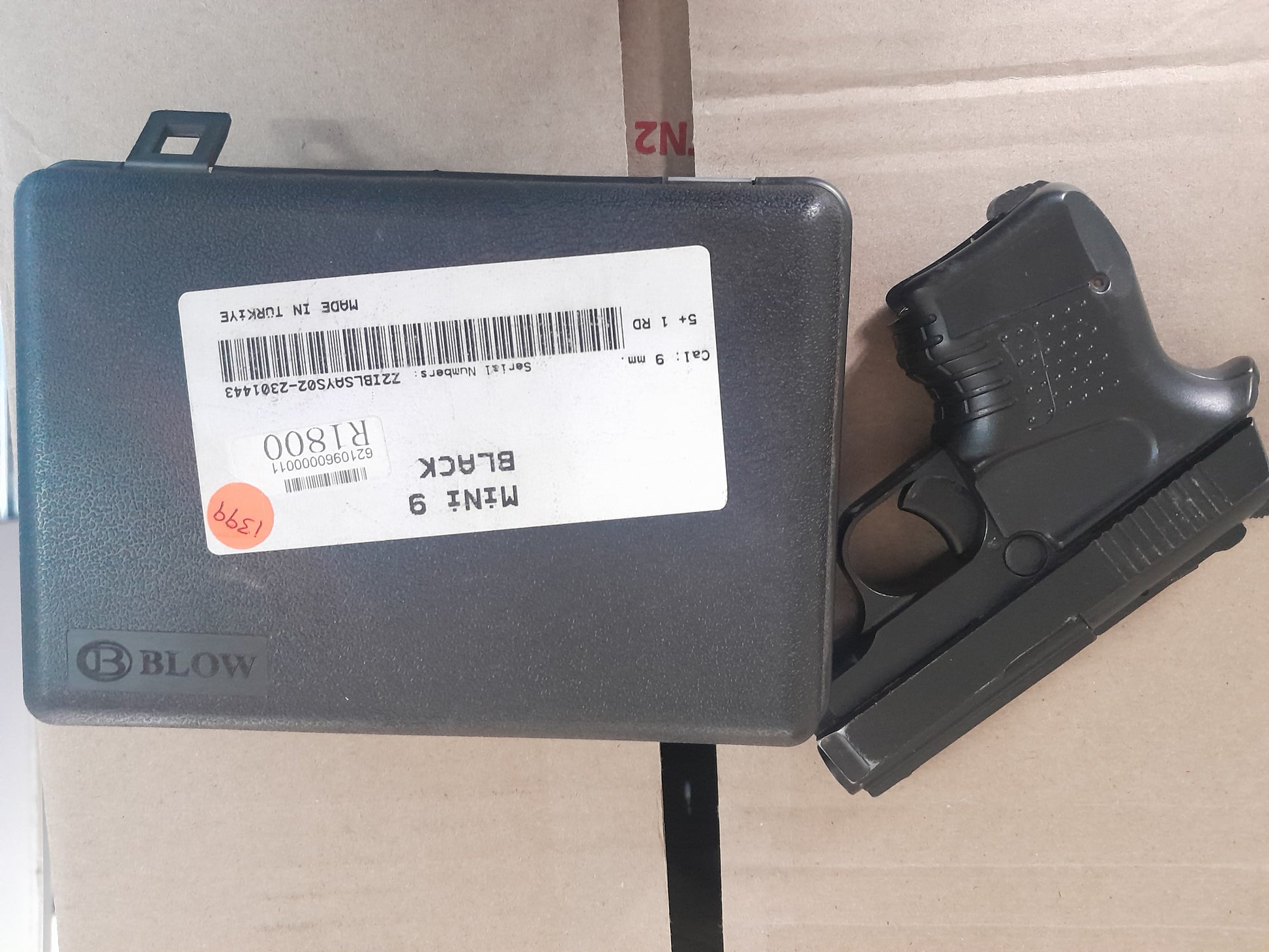 Blow Mini 9 blank gun with pepper spray bullets, ideal for self-defense training.